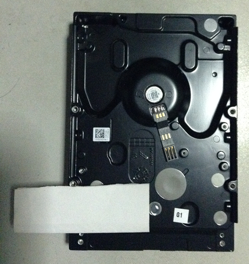 Thick paper on top of hard disk connector